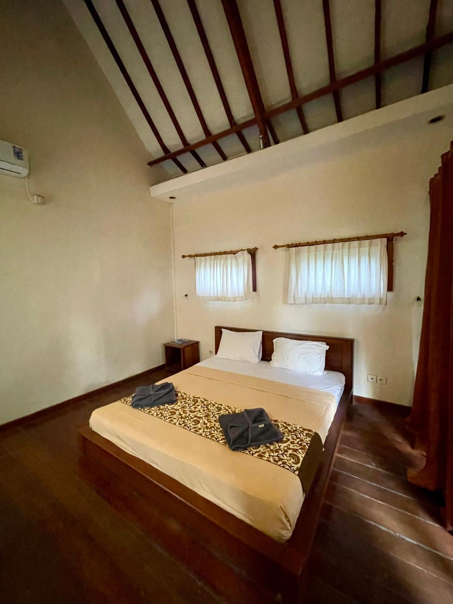 The Exile Sunsetpoint Hotel กีลีตราวางัน ภายนอก รูปภาพ